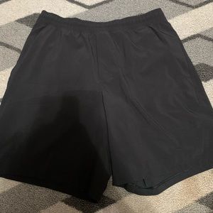 Mens medium Lulu Lemon pace breaker shorts linerless 7” black